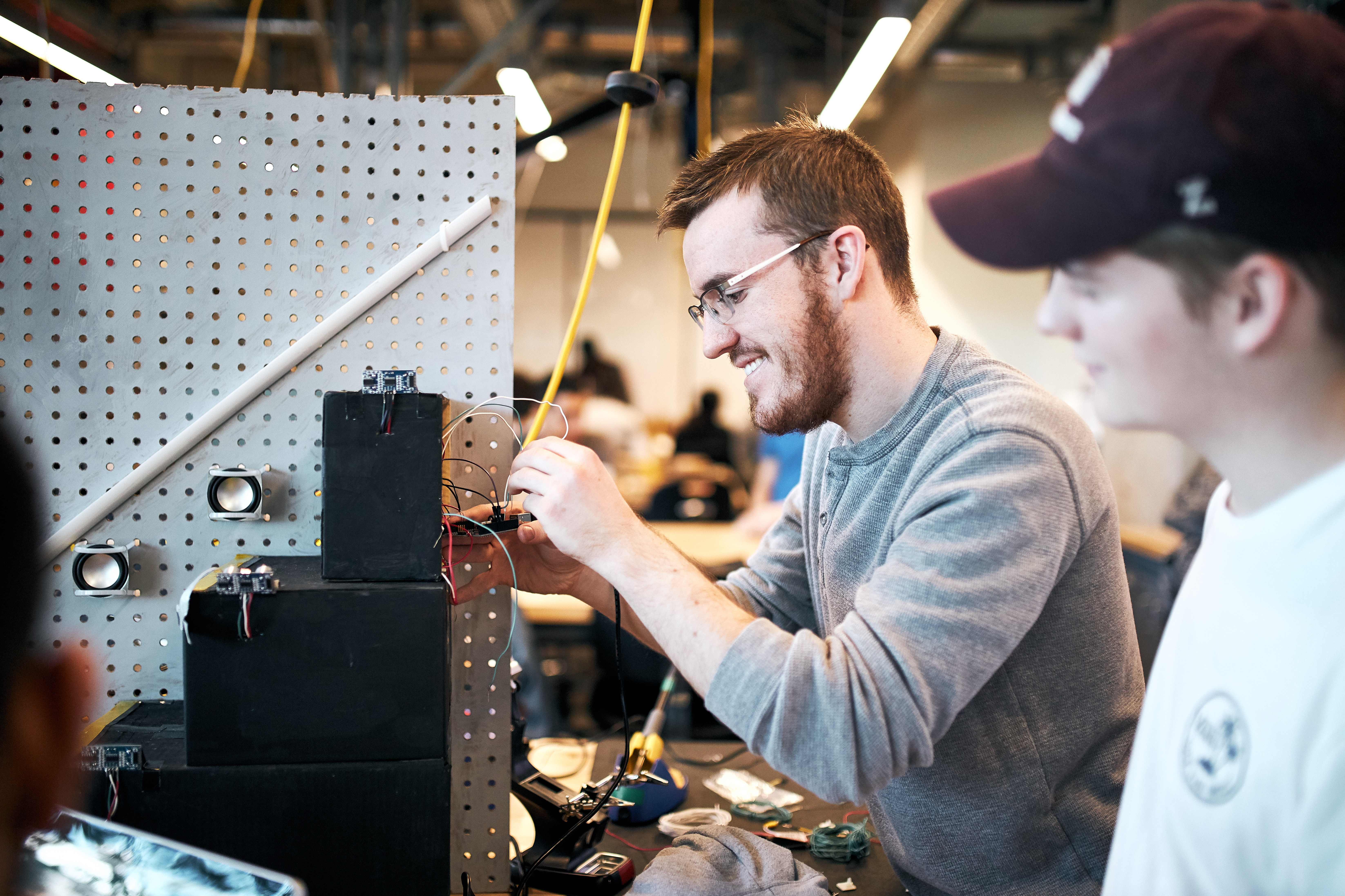 Student working on an electrical engineering project.